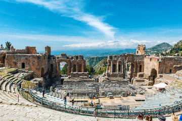 Greek theater in Taormina with Etna volcano Sicily - obrazy, fototapety, plakaty