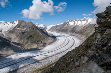 Aletschgletscher - a huge glacier among the rocks in the Alps, Switzerland