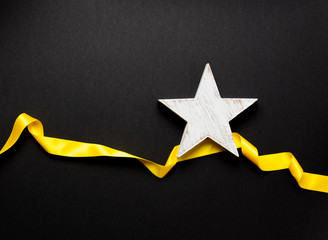 Star shape with yellow ribbon