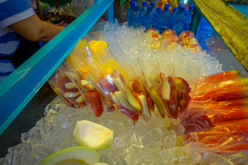 Fresh juice and fruit market stand in downtown Kuala Lumpur