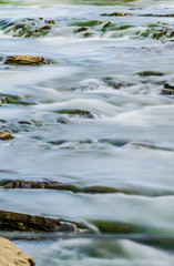Fototapeta premium Background of Carpathian mountain river with long exposure