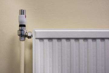 Thermostat on a radiator as part of gas central heating system