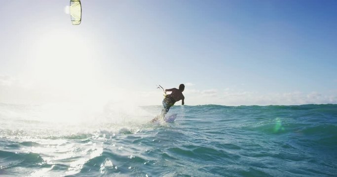 Young Man Kite Surfing in Slow Motion