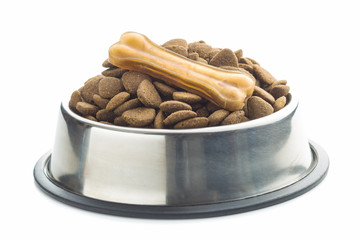 Dog chew bone and dry kibble dog food.