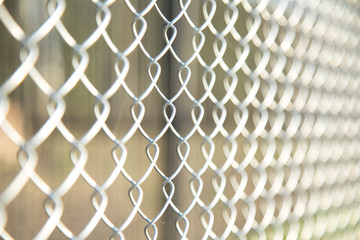 Close up Chain Fence. Metal mesh .  White tone
