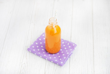 Multivitamin juice in the glass. The concept of beverages, health food and vegetarian.