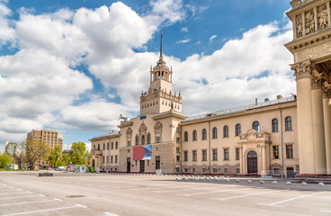 Moscow, Russian Federation - May 24, 2017: Elderly woman sitting on stairs begging alms, near Red Square of Moscow.
