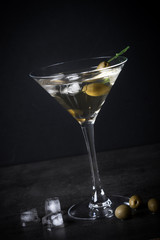 Martini cocktail on dark