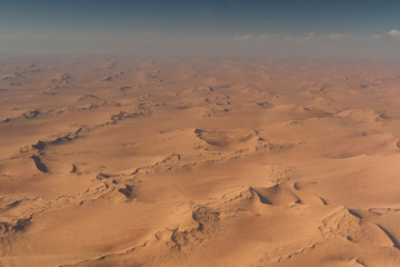 Fototapeta na wymiar Waves of sand dunes