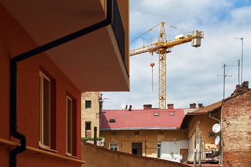 Building with crane in the old city neighbourhood