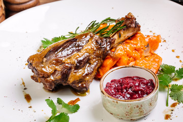 Braised lamb shank with roasted vegetables puree