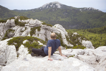 Hiker on Crikvena peak, Velebit mountain - Croatia