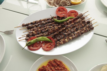 food meat salad appetizer dinner beef meal dish plate restaurant vegatable red tomato cooked barbecue gourmet snack asia