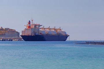 Fototapeta premium Malta. Marsaxlokk. The ship is a gas carrier.