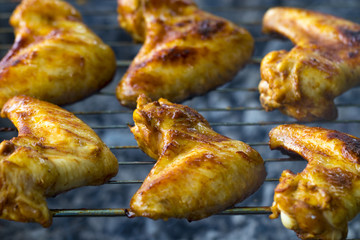 Hot chicken wings on baking tray