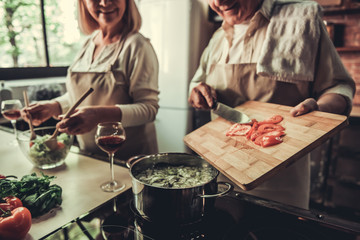 Old couple in kitchen
