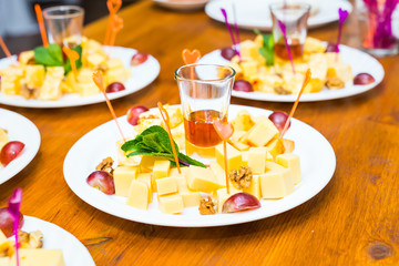 Cubes of yellow cheese