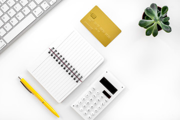 accountant work desk with credit card and notebook for online payment white background top view space for text