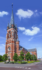 Fototapeta na wymiar Neo-Gothic OLV brick church (1907) in Arendonk Belgium, protected monument since 1999.