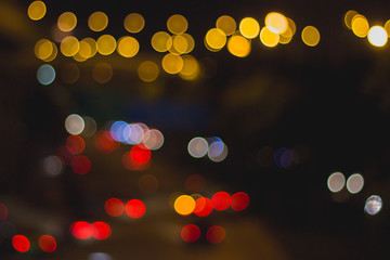 Abstract circular bokeh background of traffic lights on the Road
