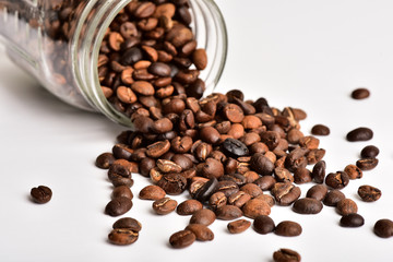 Coffee Beans Spilling out of Mason Jar