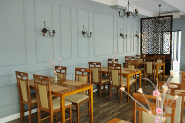 Vintage restaurant room with wooden furniture