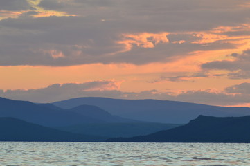 sunset  sky sea mountain landscape