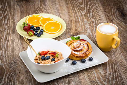 Photo of healthy breakfast on wooden background