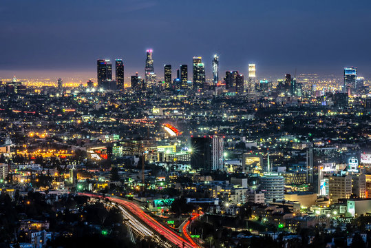 Night view of downtown Los Angeles, surrounding neighborhoods and highways