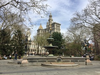 Fountain at City Hall park with blue sky, New York