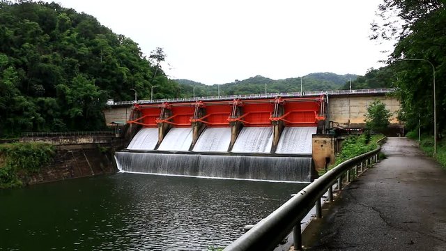 Hydroelectric dam and spillway in the mountains, Kiew Lom Dam , Wang River, Lampang,Thailand