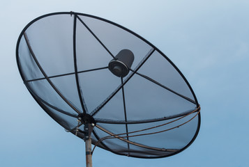 Satellite dish communication network and blue sky.