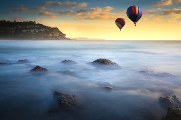 Hot air balloon over Whale beach in summer, Sydney, Australia