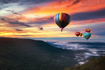 Hot air balloon over Khao yai national park in morning with beautiful sky, Thailand
