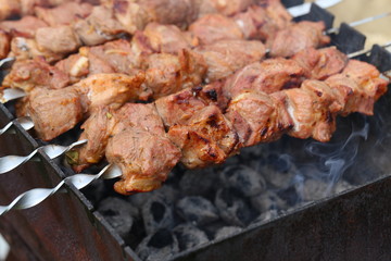 Meat is grilled / Schaschlik / Barbecue cooking