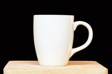 cup of hot coffee on a dark background