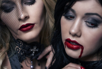 Young women in dark room .