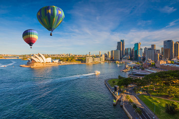 Hot air balloon over Sydney bay in evening, Sydney, Australia