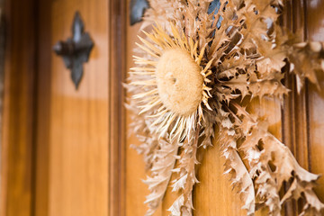 dried sunflower decorating door