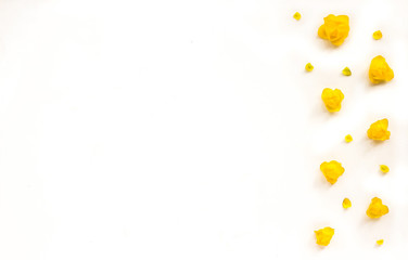 Flowers composition. Card with yellow flowers on white background. Flat lay, top view, copy space, mock up