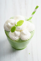 Freshly blended green smoothie in glass