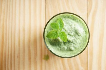 Freshly blended green smoothie in glass