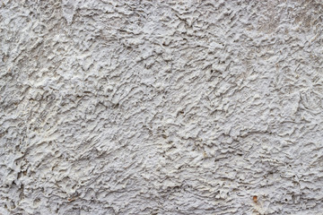 Wall plaster. Gray plastered background in natural light. Horizontal.
