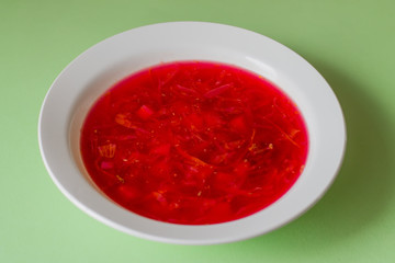 Borsch in a white plate. National Russian Food