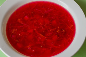 Borsch in a white plate. National Russian Food