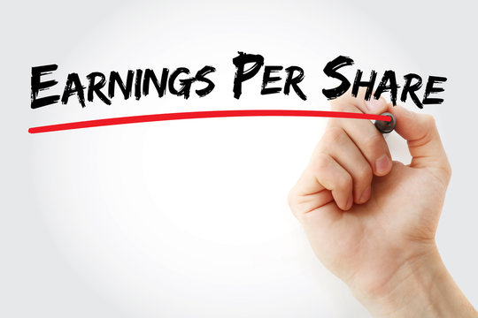 Hand writing Earnings Per Share with marker, concept background