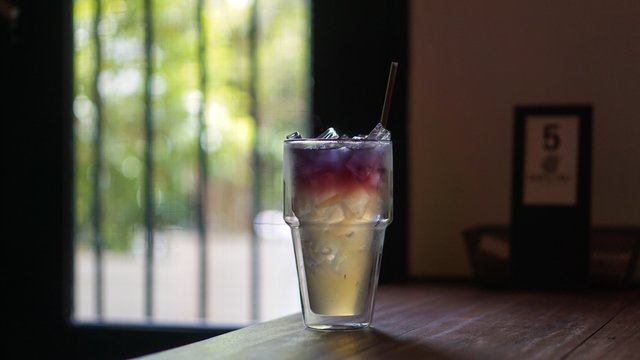 iced green tea with blueberry, summer drink.