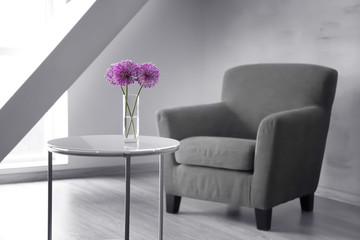 Beautiful flower bouquet on coffee table in room