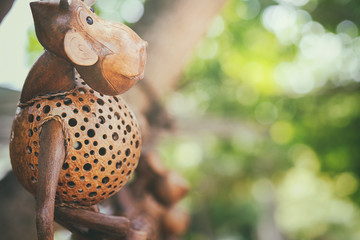 Monkey doll made of coconut, play cute Naughty in nature green.