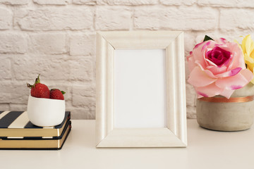 Frame Mockup. White Frame Mock up. Cream Picture Frame, Vase With Pink Roses, Strawberries on Stripe Notebooks. Product Frame Mockup. Wall Art Display Template, Brick Wall